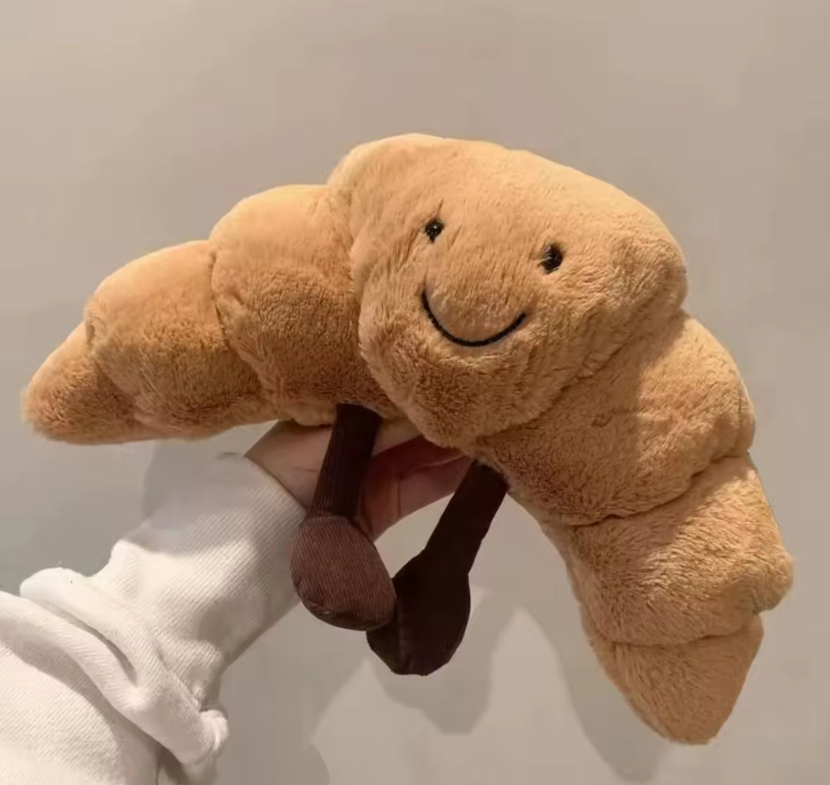 Peluche croissant rigolote cadeau insolite enfant et adulte