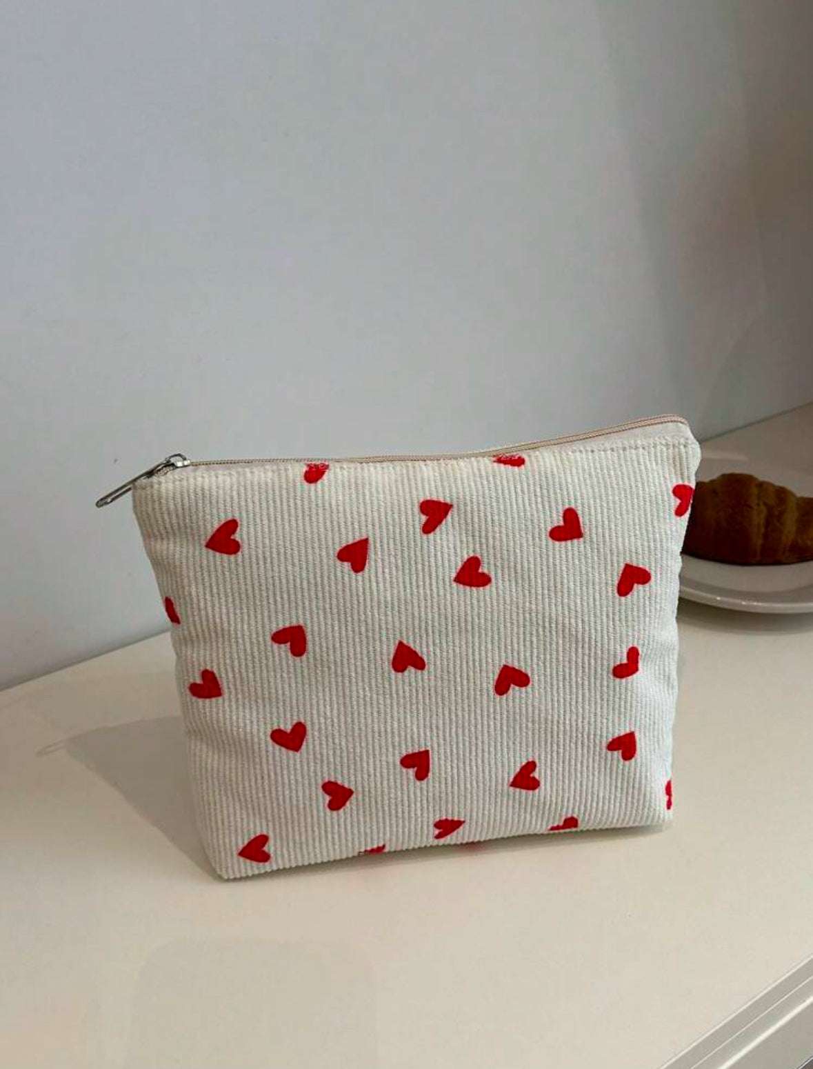 Pochette à motifs cœurs