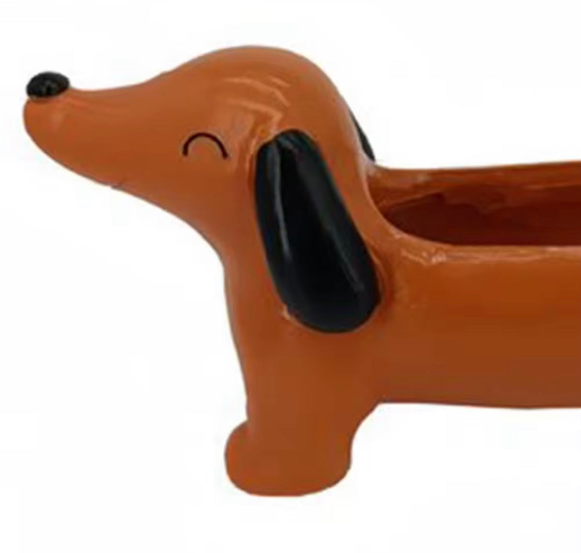 Pot de fleurs original en forme de chien teckel – objet déco tendance