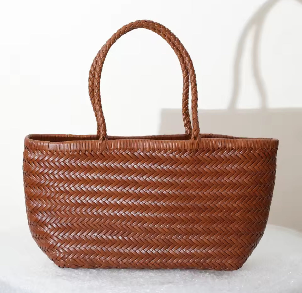 Sac tressé en cuir véritable