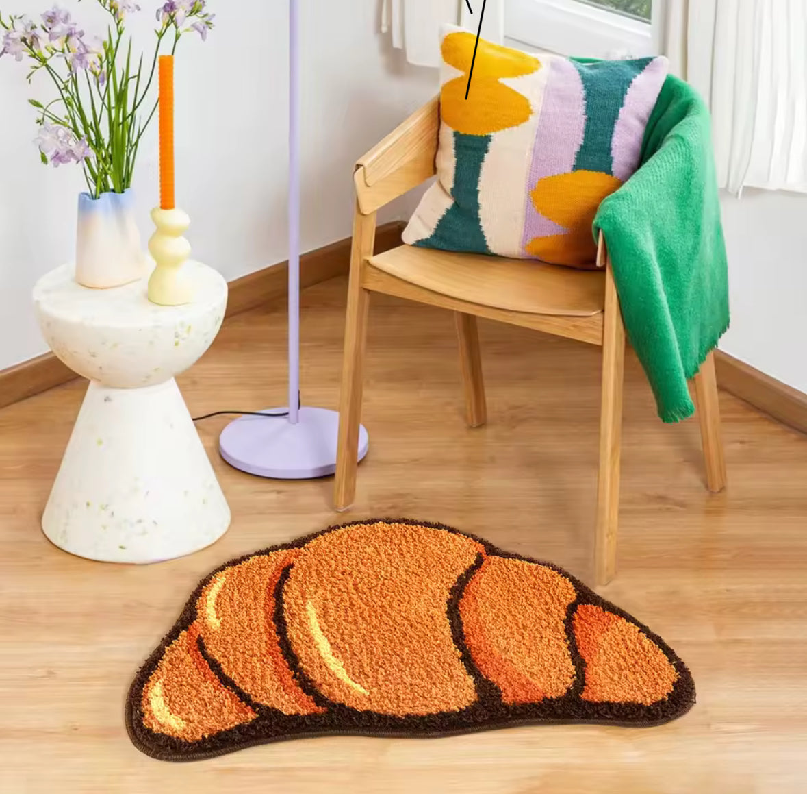 Tapis gourmand inspiré du croissant français, parfait pour une déco moderne et humoristique