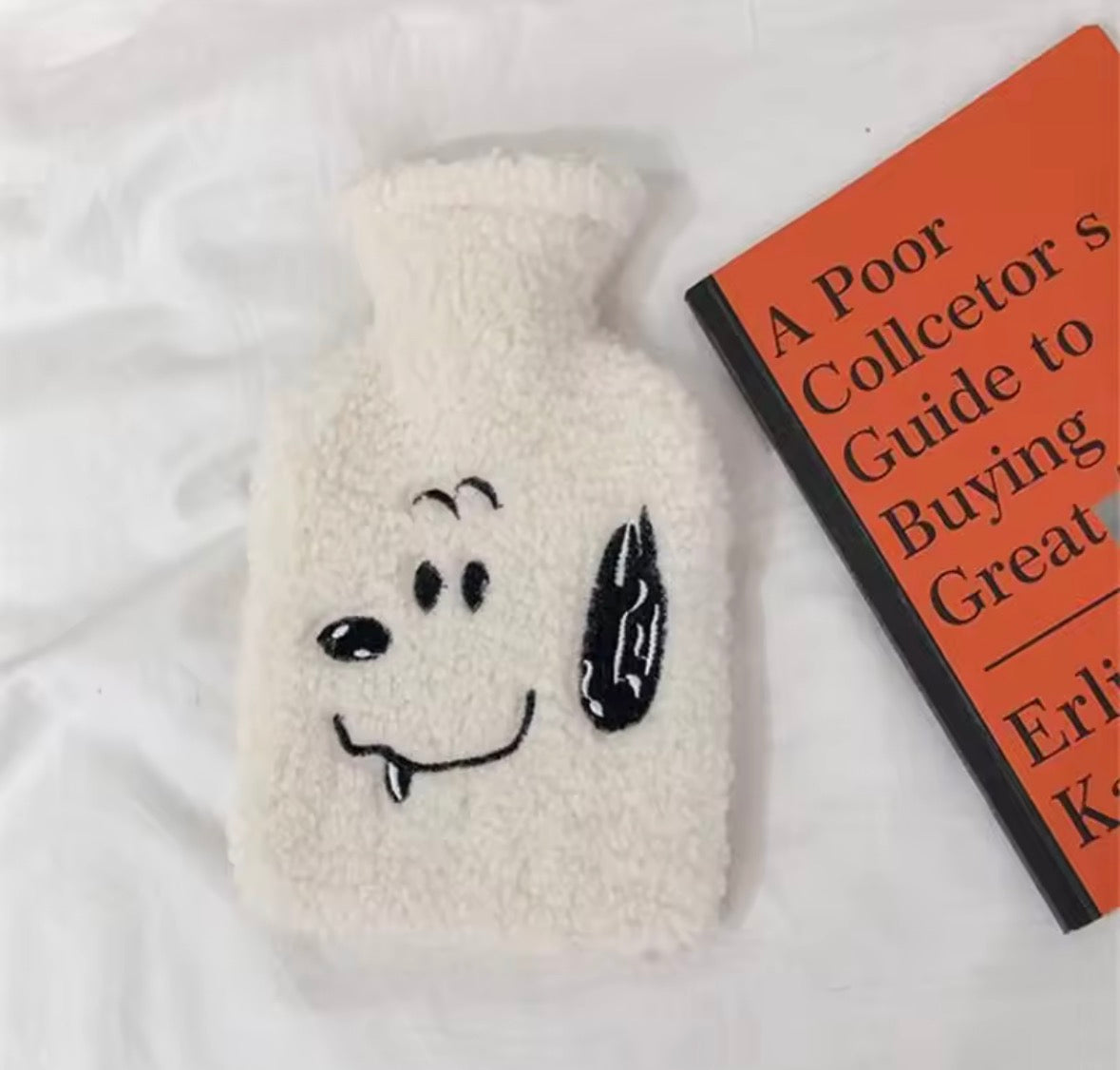 Bouillotte Snoopy douce et réconfortante, parfaite pour créer une ambiance cocooning