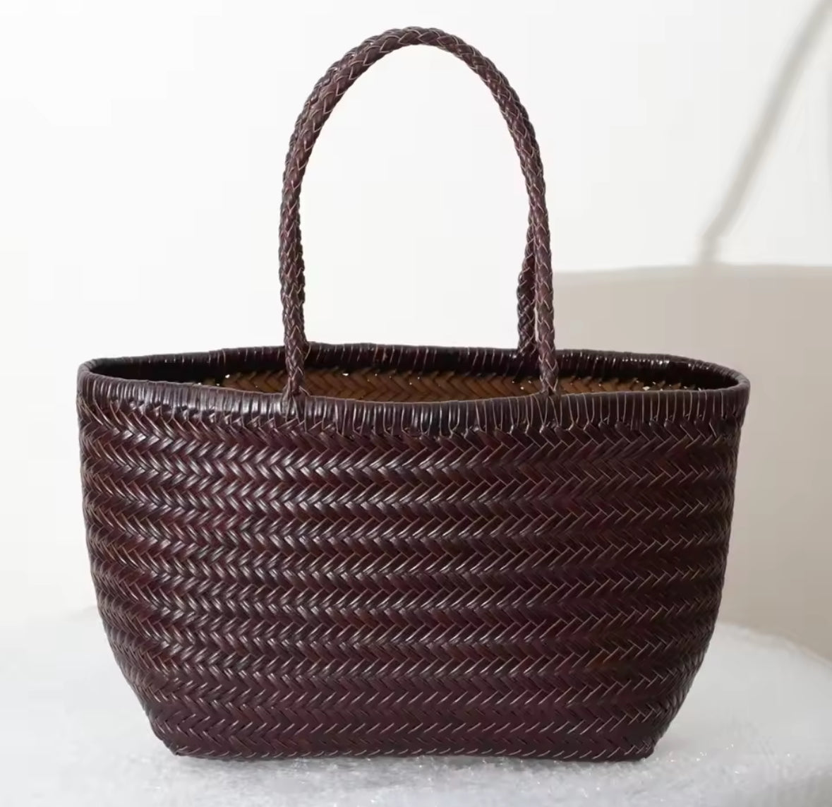 Sac tressé en cuir véritable