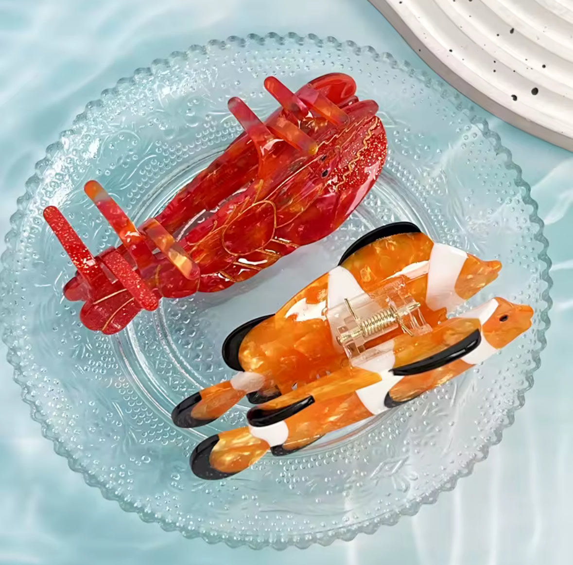 Pinces à cheveux homard rouge et poisson clown sur fond aquatique en résine brillante
