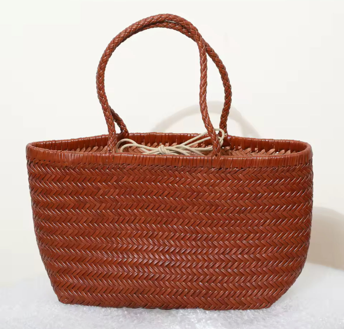 Sac tressé en cuir véritable