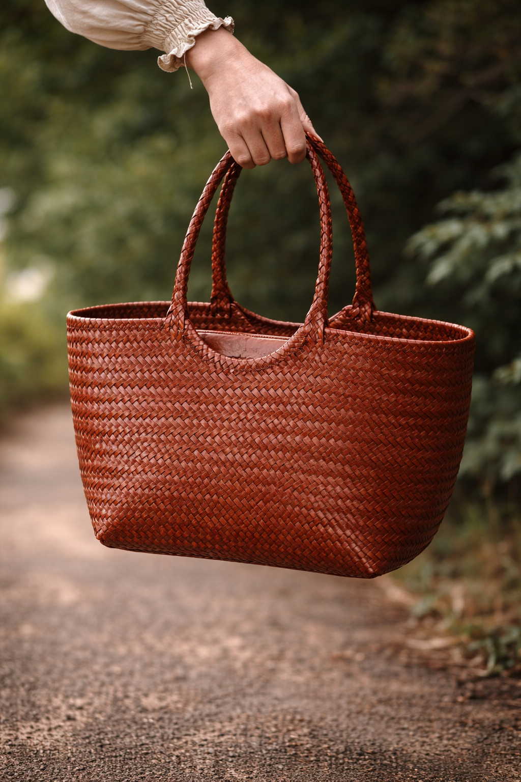 Sac tressé en cuir véritable